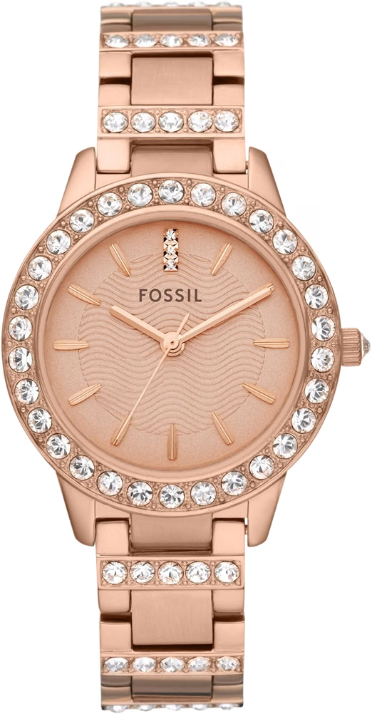 Foto del reloj Fossil dorado rosado sobre fondo claro, tomada de frente